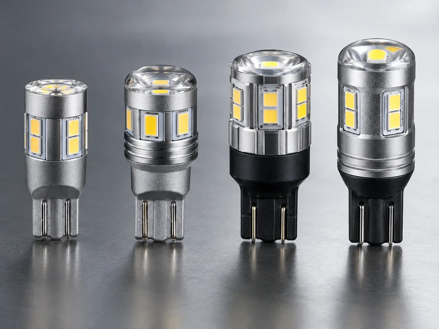 LED reverse light bulbs in 921, 912, T15 and W16W sizes laid out together
