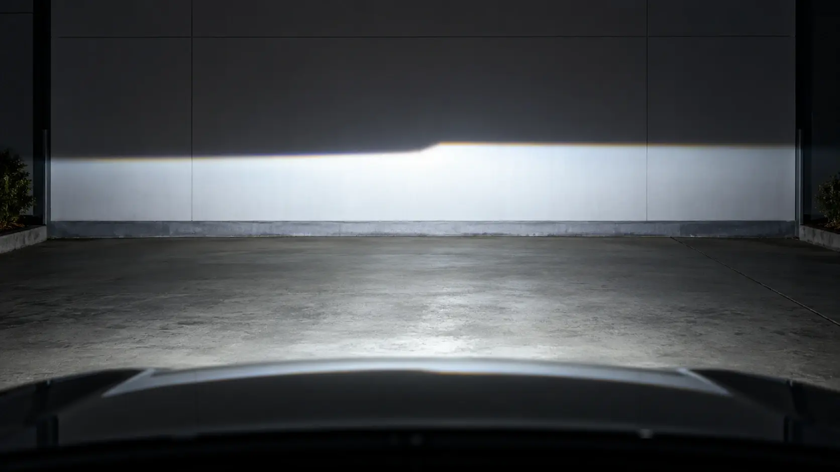 Flat cut beam projector beam pattern with the cut-off line projected on a wall