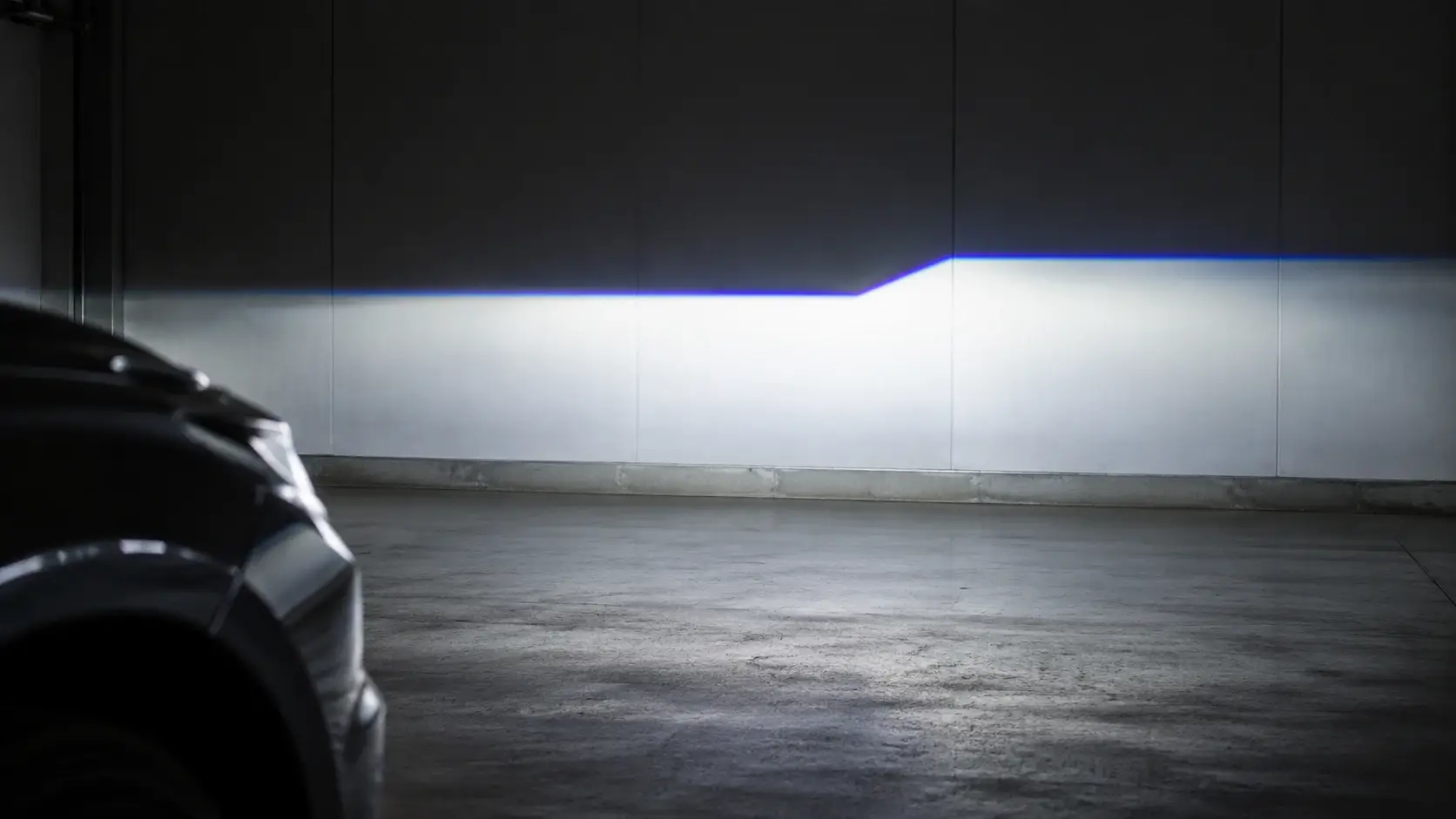 Laser beam projector beam pattern with the cut-off line projected on a wall